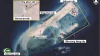Description: nh vệ tinh Airbus Defence & Space chụp ngy 14/11/2014 cho thấy Trung Quốc đ cải tạo v mở rộng đ Chữ Thập thnh đảo nhn tạo rất lớn (hơn đảo Ba Bnh đang bị Đi Loan chiếm đng)