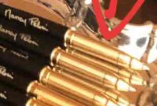 Image result for PELOSI WITH the signed gold pens"