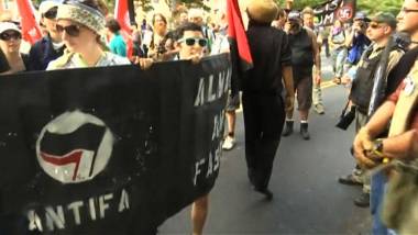 Image result for Group of Antifa protest against white supremacy in Virginia last week
